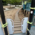 Paterson Park playground bridge viewed from inside the play structure for ages 5-12