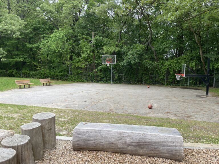 Paterson Park Basketball Court with two toops and seating areas