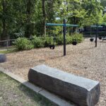 Paterson Park features a separate toddler swing area for ages 2-5 with ample seating