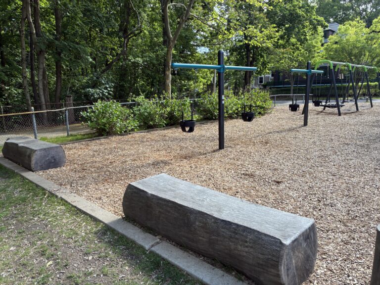 Paterson Park features a separate toddler swing area for ages 2-5 with ample seating