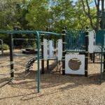 Paterson Park includes classic play features for ages 5-12 including a c-shaped overhead ladder and sliding/fire pole