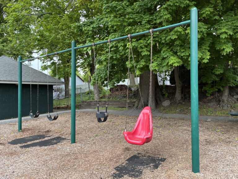 Pleasant St Park playground swings for ages 2-12
