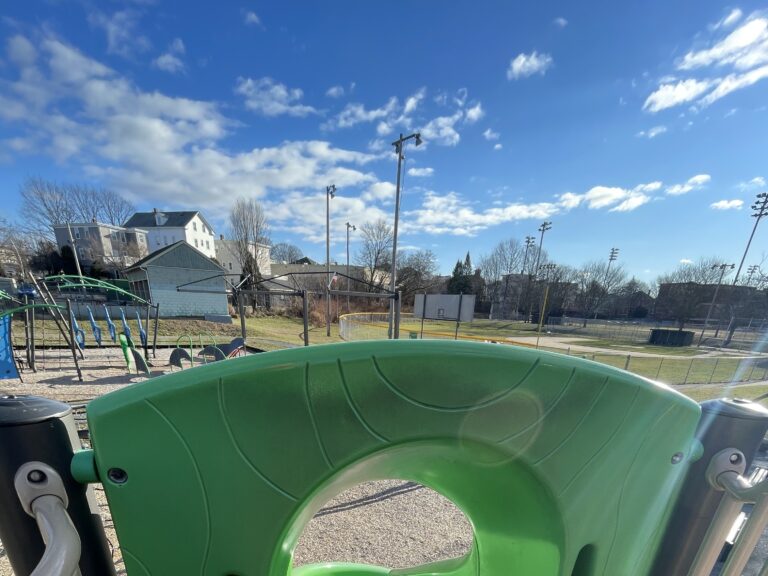 Prete-Metcalf Park view from atop the playground spiral slide for ages 5-12 in winter. Overlooking Prete field and the parkour fitness area