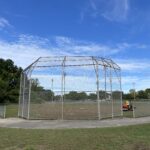 Prete-Metcalf Park field 3 being groomed for softball. Paved walking path connects all 3 fields and 2 playgrounds.