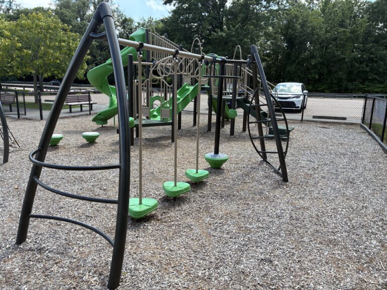 Prete-Metcalf Park playground for ages 5-12 has an obstacle course layout leading to a traditional climbing structure with slides