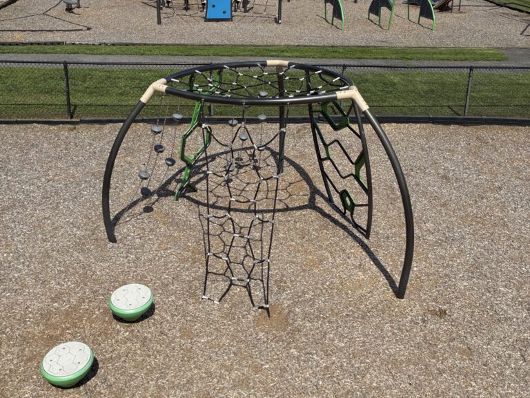 Prete-Metcalf Park playground for ages 5-12 features a variety of climbing structures like this rope dome functionally linked to the main structure with stepping pods