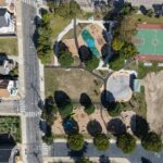 Richardson Park aerial photo September 2025 showing completed playground and waterpark with ballfield renovations underway
