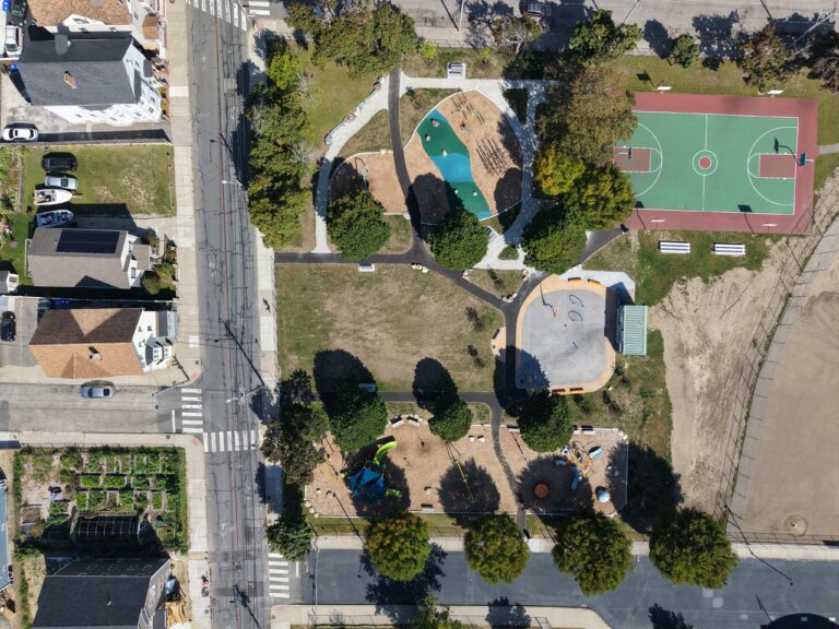 Richardson Park aerial photo September 2025 showing completed playground and waterpark with ballfield renovations underway