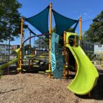 Richardson Park playground equipment for ages 5-12 including large slide and shade sail