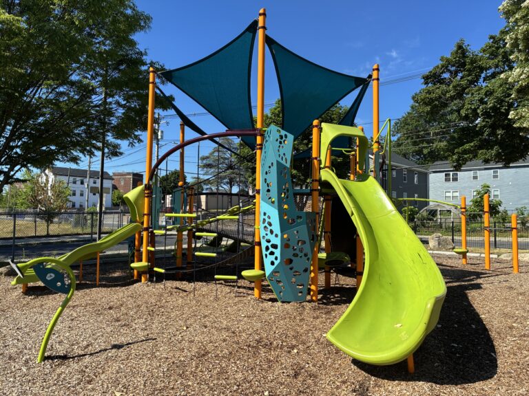 Richardson Park playground equipment for ages 5-12 including large slide and shade sail