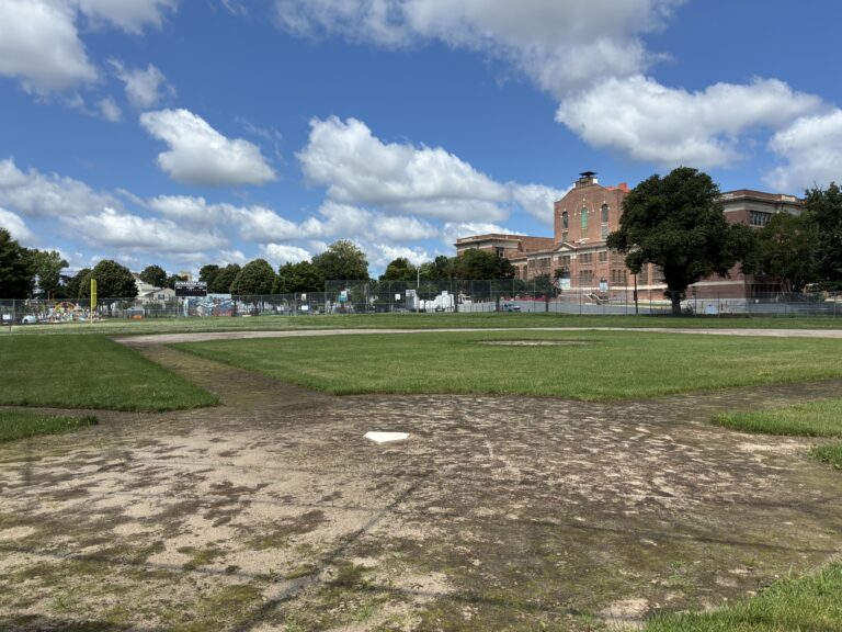 Richardson Park baseball field under construction from behind the plate looking out towards new scoreboard in left field
