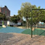 Richardson Park fitness and parkour equipment with rubberized berm for open play