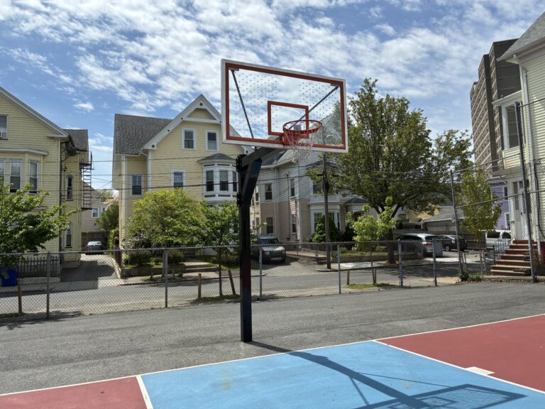 Ridge St Park basketball court features polycarbonate backboards with breakaway rims