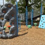 Ridge St Park playground for ages 2-12 features two different rock climbers