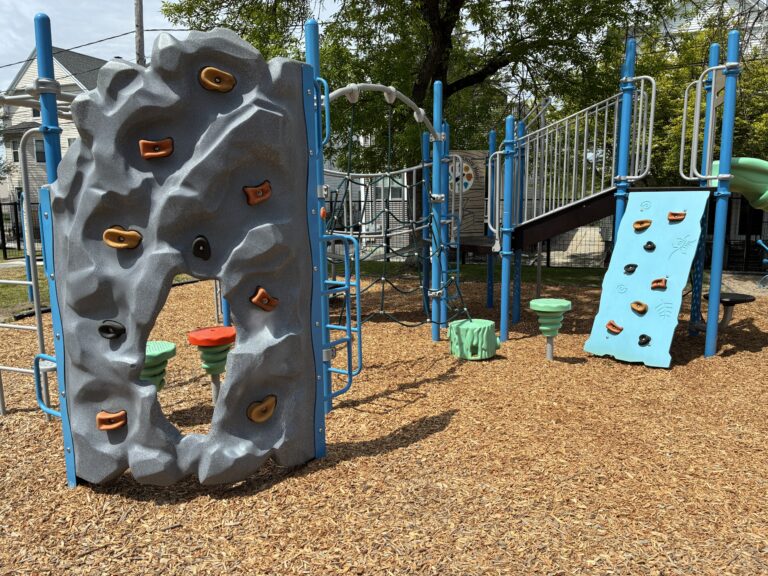 Ridge St Park playground for ages 2-12 features two different rock climbers