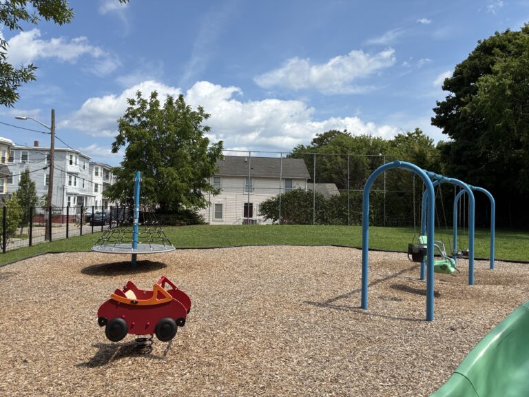 Ridge St Park features a red car spring rocker for ages 2-5