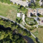 Riverside Park aerial photo in September 2025 showing the Woonasquatucket River that runs alongside the park