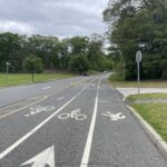 Roger Williams Park Softball Field parking lot exit facing north showing walk and bike lanes