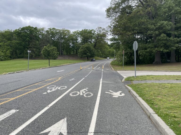 Roger Williams Park Softball Field parking lot exit facing north showing walk and bike lanes