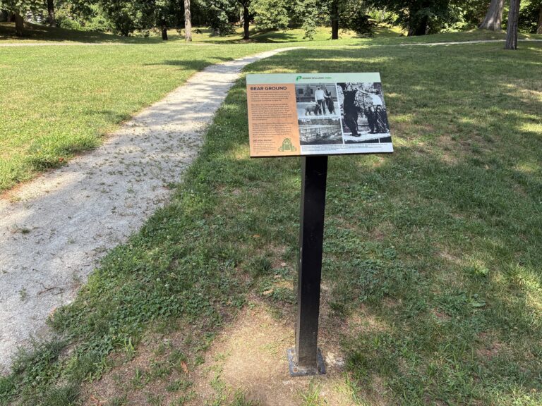 Roger Williams Park Bear Ground interpretive sign and stone dust path to the play area
