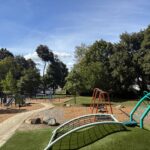 Viscolosi Park looking down at teh playground from the hill in September
